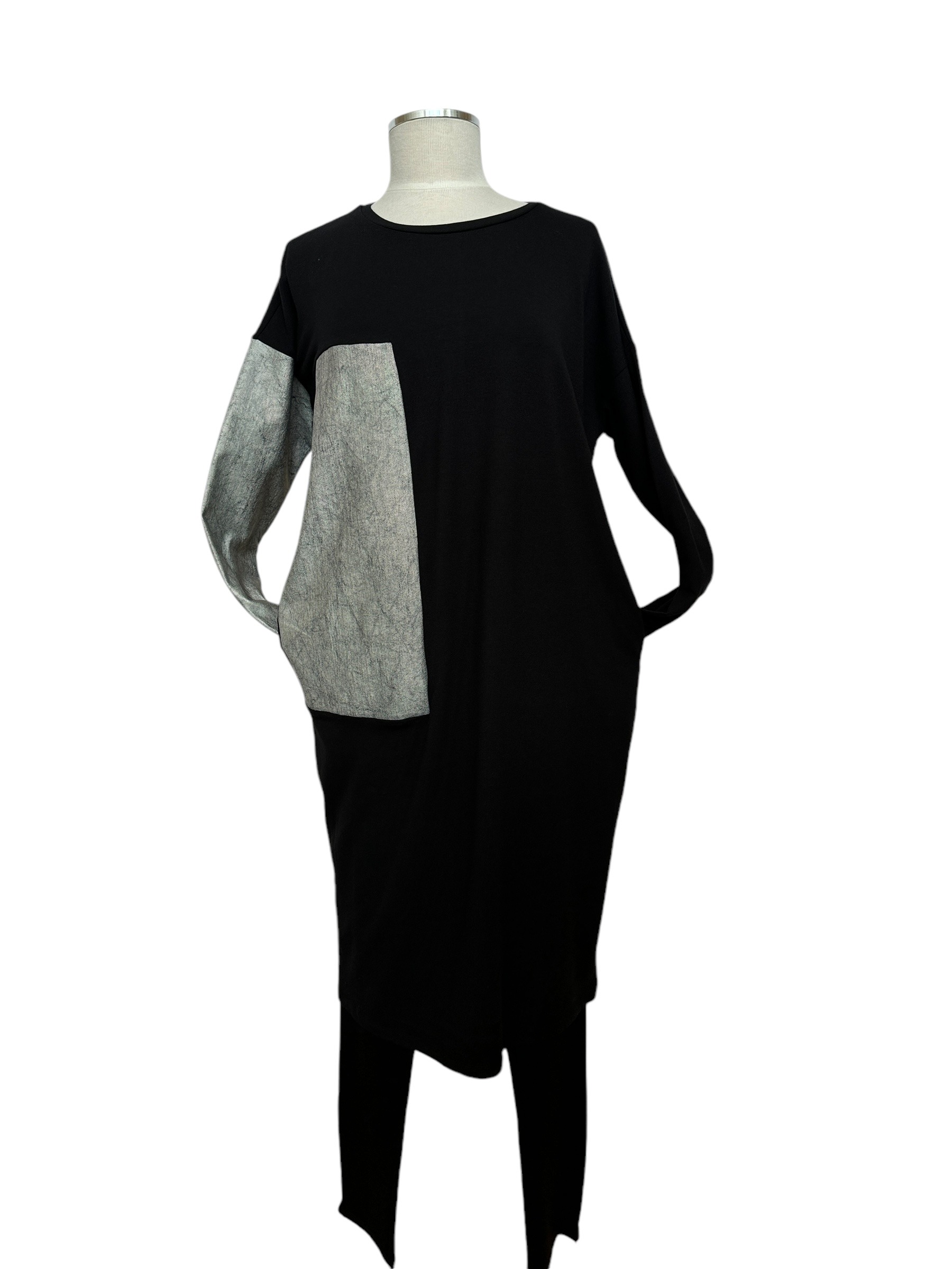 Front image of black knit dress with silver metallic detail & pockets